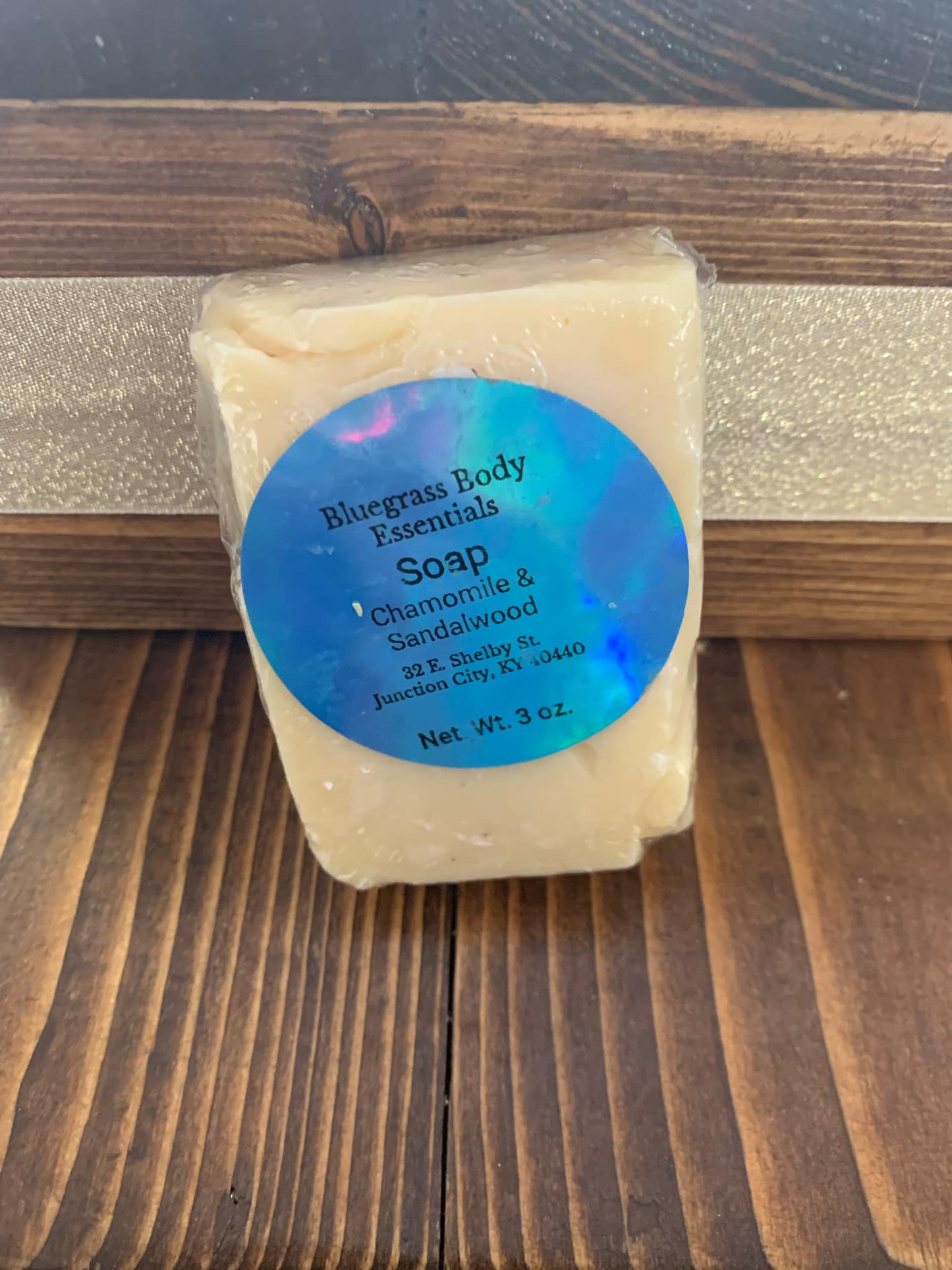 Chamomile & Sandalwood: “A serene blend of soothing chamomile and warm sandalwood, crafted to calm the mind and comfort the skin.